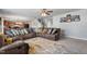 Spacious living room featuring a large sectional sofa, neutral tones, and a decorative area rug at 59 Nevada Ct, Clayton, NC 27527