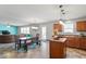 Open-concept living room, dining area, and kitchen with modern finishes and plenty of natural light at 59 Nevada Ct, Clayton, NC 27527