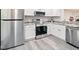 Stylish kitchen with stainless steel appliances and granite countertops at 603 Middleton Ave, Cary, NC 27513