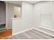Open living area with modern flooring and a glimpse of the bathroom at 603 Middleton Ave, Cary, NC 27513