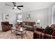 Bright and airy living room with contemporary furnishings, providing a cozy and inviting space at 605 Larchwood Dr, Durham, NC 27713