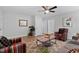Spacious living room with hardwood floors, modern decor, and plenty of room for relaxation and entertaining at 605 Larchwood Dr, Durham, NC 27713
