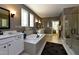 Bright bathroom with double vanities, soaking tub, and glass enclosed shower at , Wake Forest, NC 27587