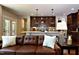 Stylish kitchen and living room featuring hardwood floors and modern, stainless steel appliances at , Wake Forest, NC 27587