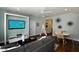Modern living room with a large television, comfortable seating, and stylish decor at , Wake Forest, NC 27587