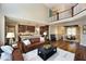 Bright living area with hardwood floors, stone fireplace, and large windows creating a warm and inviting space at , Wake Forest, NC 27587