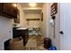 Functional mudroom with cabinetry, sink, coat hooks, and tiled flooring at , Wake Forest, NC 27587