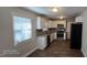 Modern kitchen featuring stainless steel appliances, sleek countertops, and ample natural light at 626 Hoover Rd, Durham, NC 27703