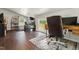 Bright home office space with a large desk, comfortable chair, and natural light at 7227 Cleveland Rd Rd, Clayton, NC 27520
