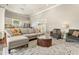 Spacious living area with large sectional, area rug, and open concept design at 7227 Cleveland Rd Rd, Clayton, NC 27520