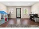 Versatile space with wood floors, natural light, and room for various activities and furniture at 7227 Cleveland Rd Rd, Clayton, NC 27520