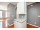 Kitchenette showcasing ample storage space, countertops, and great connectivity to other rooms at 7616 Satinwing Ln, Raleigh, NC 27617