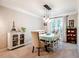 Elegant dining room with stylish lighting and a view of the outdoors at 8 Wexford Dr, Durham, NC 27713