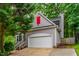 Charming home featuring a two-car garage and vibrant red window accent at 8 Wexford Dr, Durham, NC 27713
