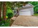 Gray house with a two-car garage, front yard, and inviting curb appeal at 8 Wexford Dr, Durham, NC 27713