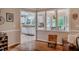 View of the kitchen and dining area from another room, showcasing the open layout and natural light at 8 Wexford Dr, Durham, NC 27713