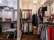 Organized walk-in closet with custom shelving and ample storage space at 8461 Lentic Ct, Raleigh, NC 27615