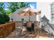 Outdoor deck with dining set, perfect for entertaining at 8724 Deerland Grove Dr, Raleigh, NC 27615