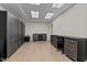 Expansive garage featuring ample storage and workspace, ideal for hobbies or professional projects at 8724 Deerland Grove Dr, Raleigh, NC 27615