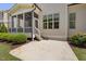 Concrete backyard patio with a screened-in porch area, ideal for outdoor entertaining at 937 Sedgefield Park Ln, Cary, NC 27519