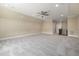 Large bonus room with plush carpet and neutral walls, perfect for relaxation or entertainment at 937 Sedgefield Park Ln, Cary, NC 27519