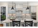 Beautiful kitchen featuring a spacious island, stainless steel appliances, and ample storage, creating a functional space at 937 Sedgefield Park Ln, Cary, NC 27519