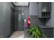 Inviting mudroom with storage bench and hooks, providing a practical and stylish transition from outdoors at 937 Sedgefield Park Ln, Cary, NC 27519