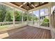 Relaxing screened porch with wood flooring and views of the backyard at 937 Sedgefield Park Ln, Cary, NC 27519
