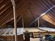 Open attic area with rafters, insulation, and flooring provides storage and potential expansion at 95 Live Oak Dr, Louisburg, NC 27549