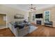 Inviting living room features a fireplace, hardwood floors, and stylish decor at 95 Live Oak Dr, Louisburg, NC 27549