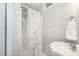 Bathroom with a standing shower and a pedestal sink at 101 Rainbow Dr, Carrboro, NC 27510