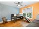 Bedroom featuring a lofted bed with a slide, wood floors, and bright natural light at 101 Rainbow Dr, Carrboro, NC 27510