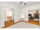 Office with hardwood floors, featuring French doors and access to other rooms at 101 Rainbow Dr, Carrboro, NC 27510