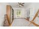 Spacious office featuring hardwood floors, large window and french doors at 101 Rainbow Dr, Carrboro, NC 27510