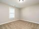 Clean bedroom with carpet, window, and neutral paint at 1015 E Maplewood, Benson, NC 27504