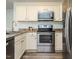 Well-appointed kitchen with stainless steel appliances and ample cabinet space at 1015 E Maplewood, Benson, NC 27504