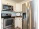 Modern kitchen featuring stainless steel appliances at 1015 E Maplewood, Benson, NC 27504