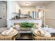 Open kitchen layout with stainless steel appliances and a breakfast bar view at 1015 E Maplewood, Benson, NC 27504