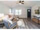 Bright living room featuring modern flooring, neutral colors, and a welcoming atmosphere at 1015 E Maplewood, Benson, NC 27504