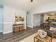 Open-concept living area with stylish accents, and easy access to the kitchen and dining spaces at 1015 E Maplewood, Benson, NC 27504