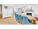 Elegant dining room with hardwood floors, fireplace, and seating for six at 102 Lake Dr, Wendell, NC 27591