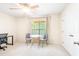 Versatile bedroom featuring a ceiling fan, natural light, and flexible space, perfect for a guest room or home office at 1028 Summerhouse Rd, Cary, NC 27519