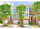 Charming townhome with brick facade, garage, and lush green trees on a sunny day at 1028 Summerhouse Rd, Cary, NC 27519