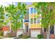 Attractive townhome with brick accents, multiple windows, and well-maintained landscaping at 1028 Summerhouse Rd, Cary, NC 27519