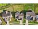 Aerial view of the property highlighting the fenced backyard, patio, and overall layout of the house at 1042 Cardross St, Burlington, NC 27215