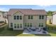 Large backyard featuring an outdoor patio, grill, and seating area perfect for entertaining at 1042 Cardross St, Burlington, NC 27215