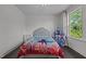 A bright bedroom featuring two large windows and dark wood floors at 1042 Cardross St, Burlington, NC 27215