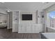 Open bonus room with custom built-ins, and large windows at 1042 Cardross St, Burlington, NC 27215