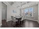 Elegant dining room with coffered ceilings, chandelier, and large windows at 1042 Cardross St, Burlington, NC 27215