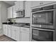 Well-equipped kitchen with stainless appliances, granite counters, and ample cabinet space at 1042 Cardross St, Burlington, NC 27215